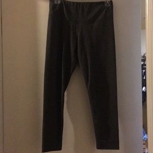 Two pairs of Capri leggings.